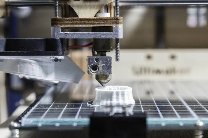 Desktop FDM printer fabricating a small prototype part